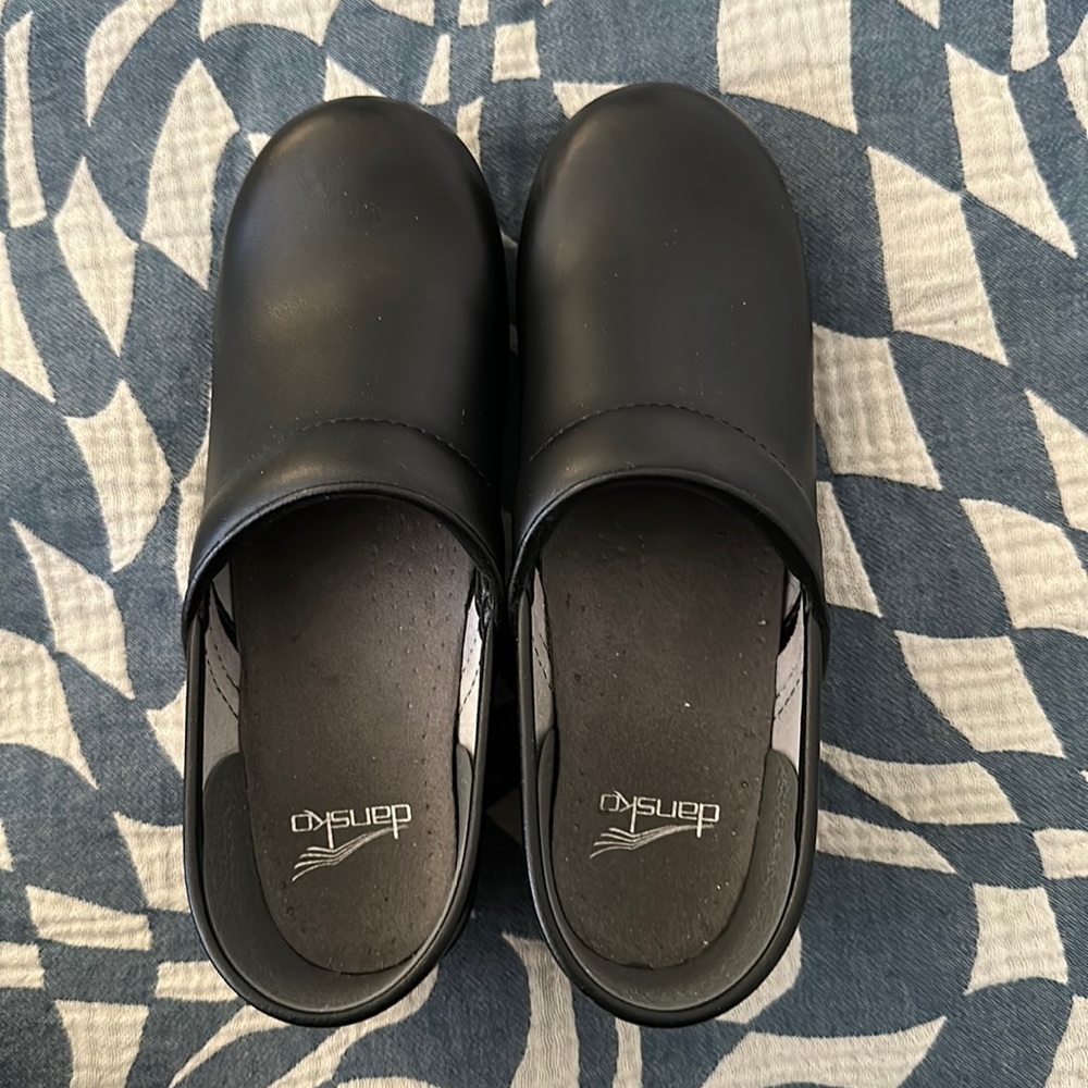 Worn a few times but look like new.  Dansko clog sz. 38